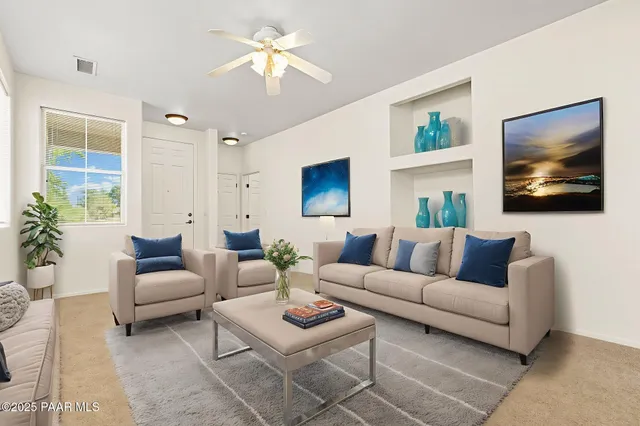 a bedroom with a bed and flat screen tv