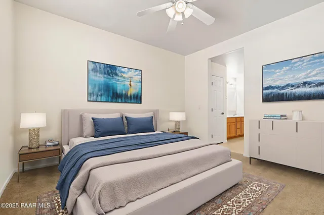 a bedroom with a bed and a couch