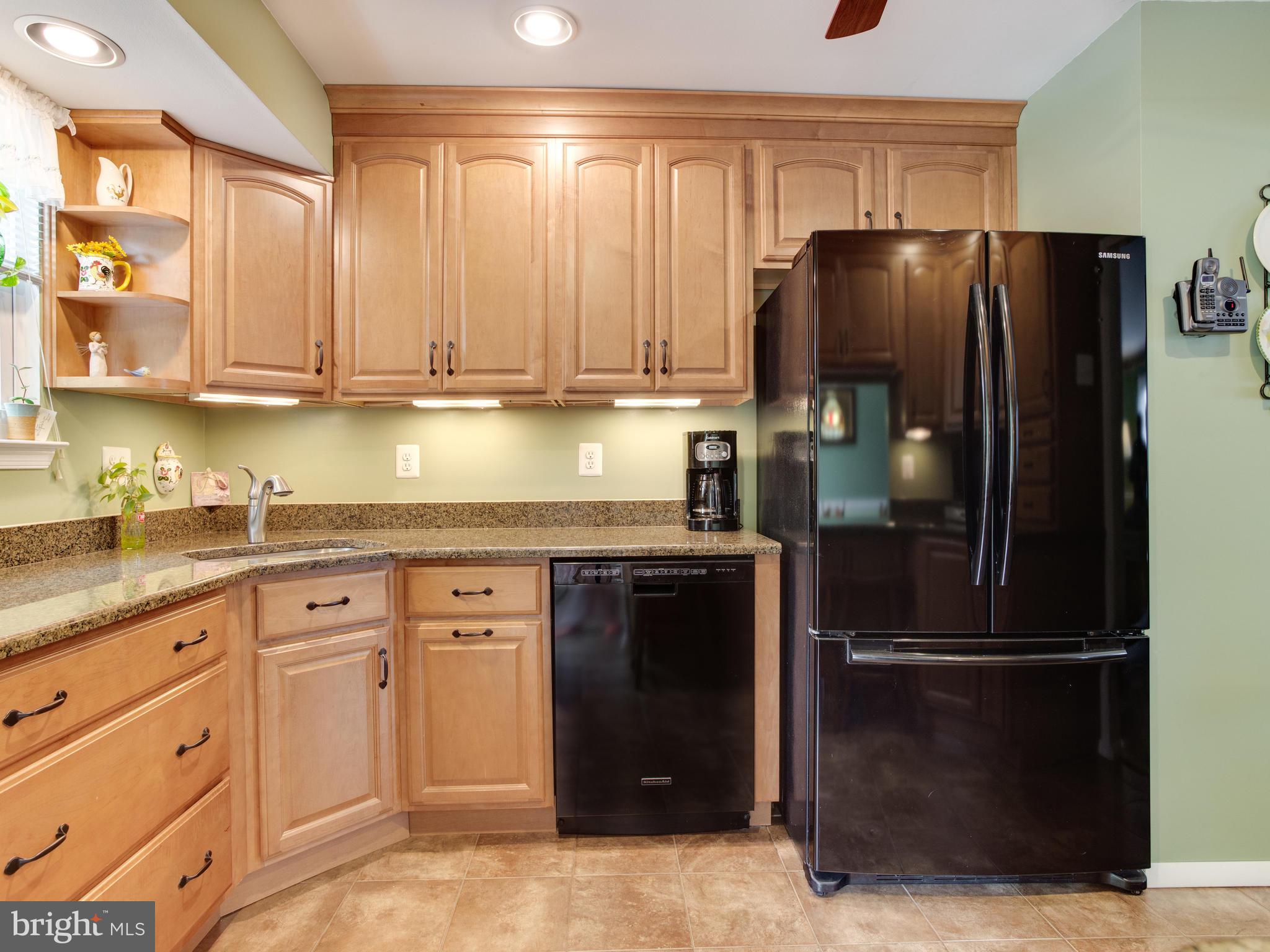 6402 Darwin Road Laurel, MD 20707 - Photo 11 of 44 Tile floors in kitchen and dining area off deck