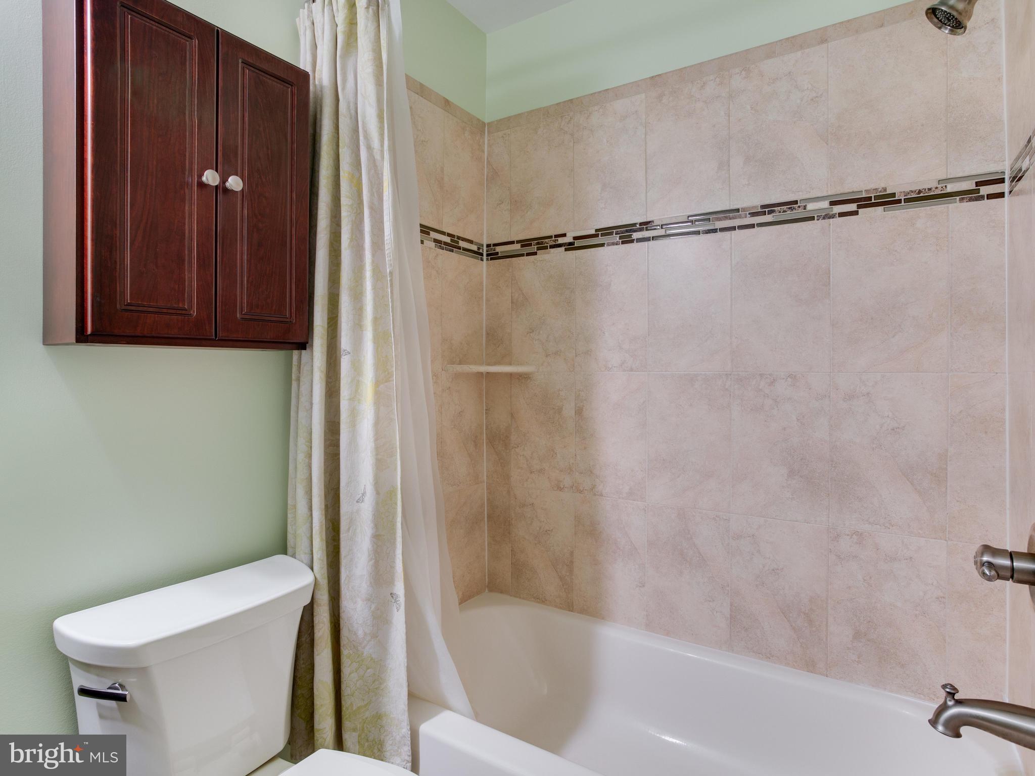 6402 Darwin Road Laurel, MD 20707 - Photo 25 of 44 Hall Bathroom