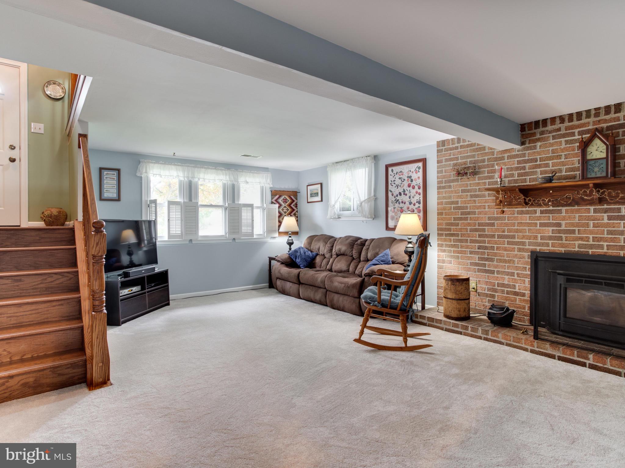 6402 Darwin Road Laurel, MD 20707 - Photo 4 of 44 Family Room with Pellet Stove