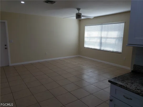 an empty room with window