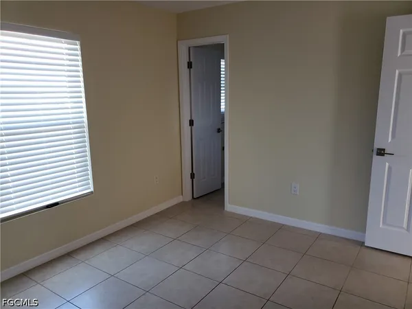 an empty room and a window