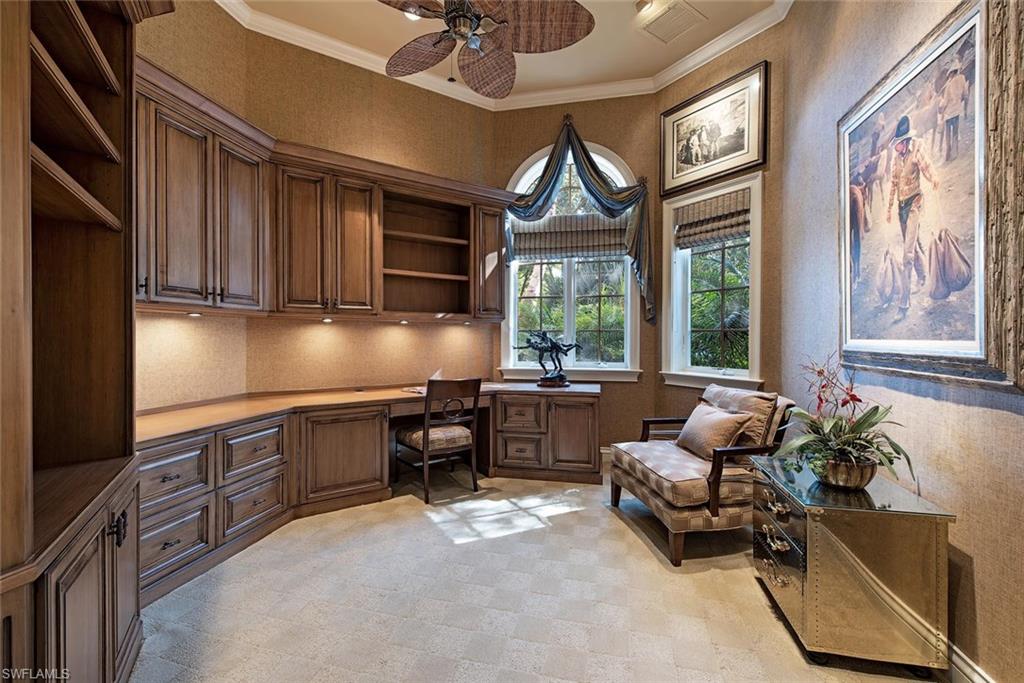 14906 Bellezza Lane Naples, FL 34110 - Photo 11 of 33 a living room with furniture and large windows