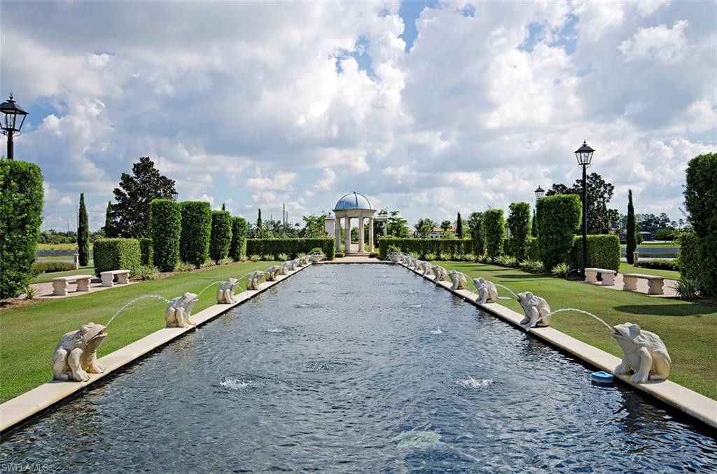 14906 Bellezza Lane Naples, FL 34110 - Photo 21 of 33 a view of a stadium that has a big playing ground