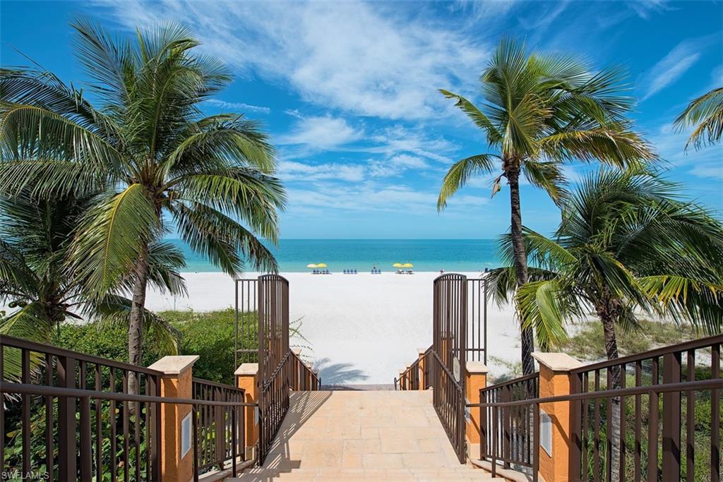 14906 Bellezza Lane Naples, FL 34110 - Photo 31 of 33 a view of a palm trees front of a house