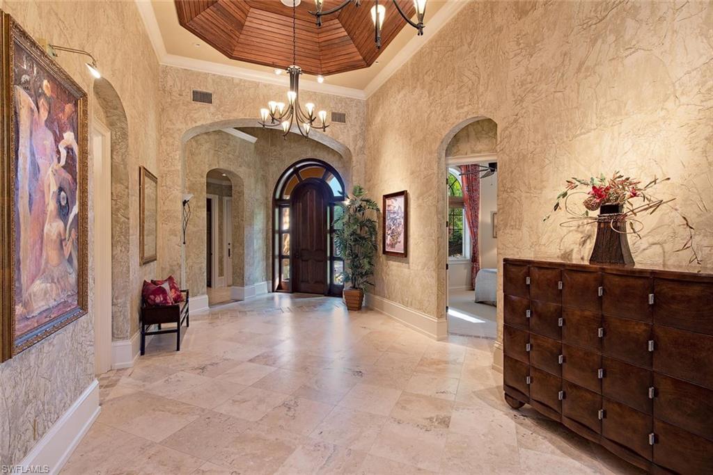 14906 Bellezza Lane Naples, FL 34110 - Photo 7 of 33 a view of front door with hallway