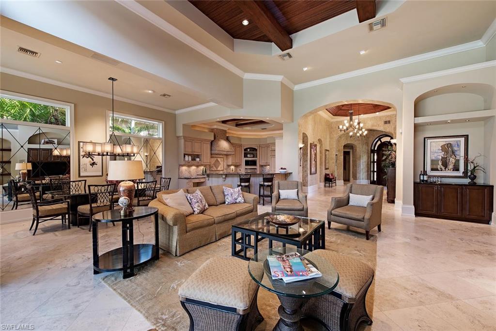14906 Bellezza Lane Naples, FL 34110 - Photo 9 of 33 a living room with furniture and a large window