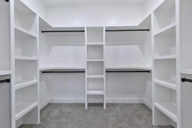 a view of an empty walk in closet