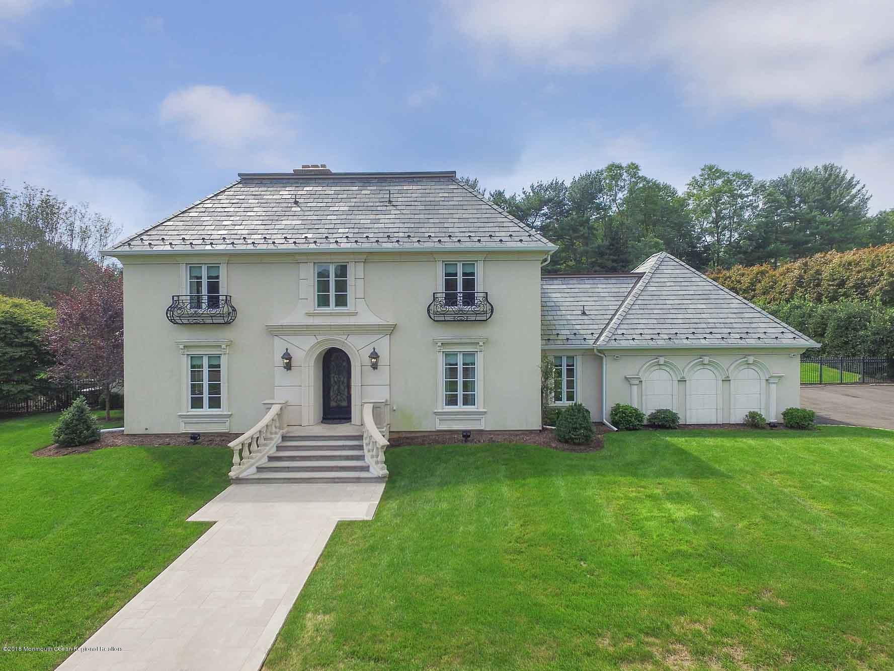 6 Woods End Road Rumson, NJ 07760 - Photo 2 of 43 front view of a house with a yard