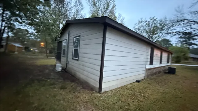 a kitchen with a sink and a stove top oven