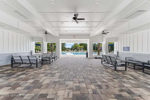 a view of a park with swings and slides