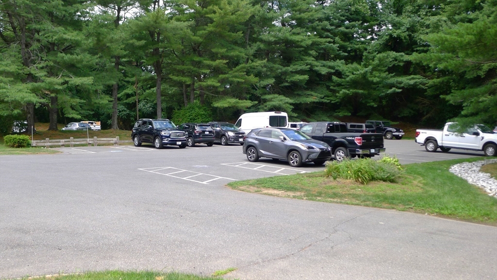 8 Ledgewood Way, Unit 20 Peabody, MA 01960 - Photo 27 of 37 a view of street with parked cars