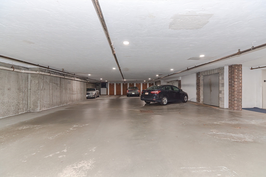 8 Ledgewood Way, Unit 20 Peabody, MA 01960 - Photo 28 of 37 a view of parking area