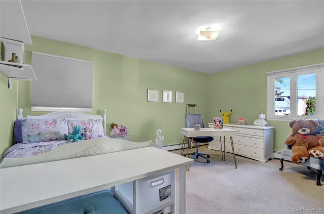 a room with a bed and furniture