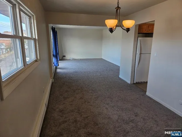 a view of a livingroom with a staircase