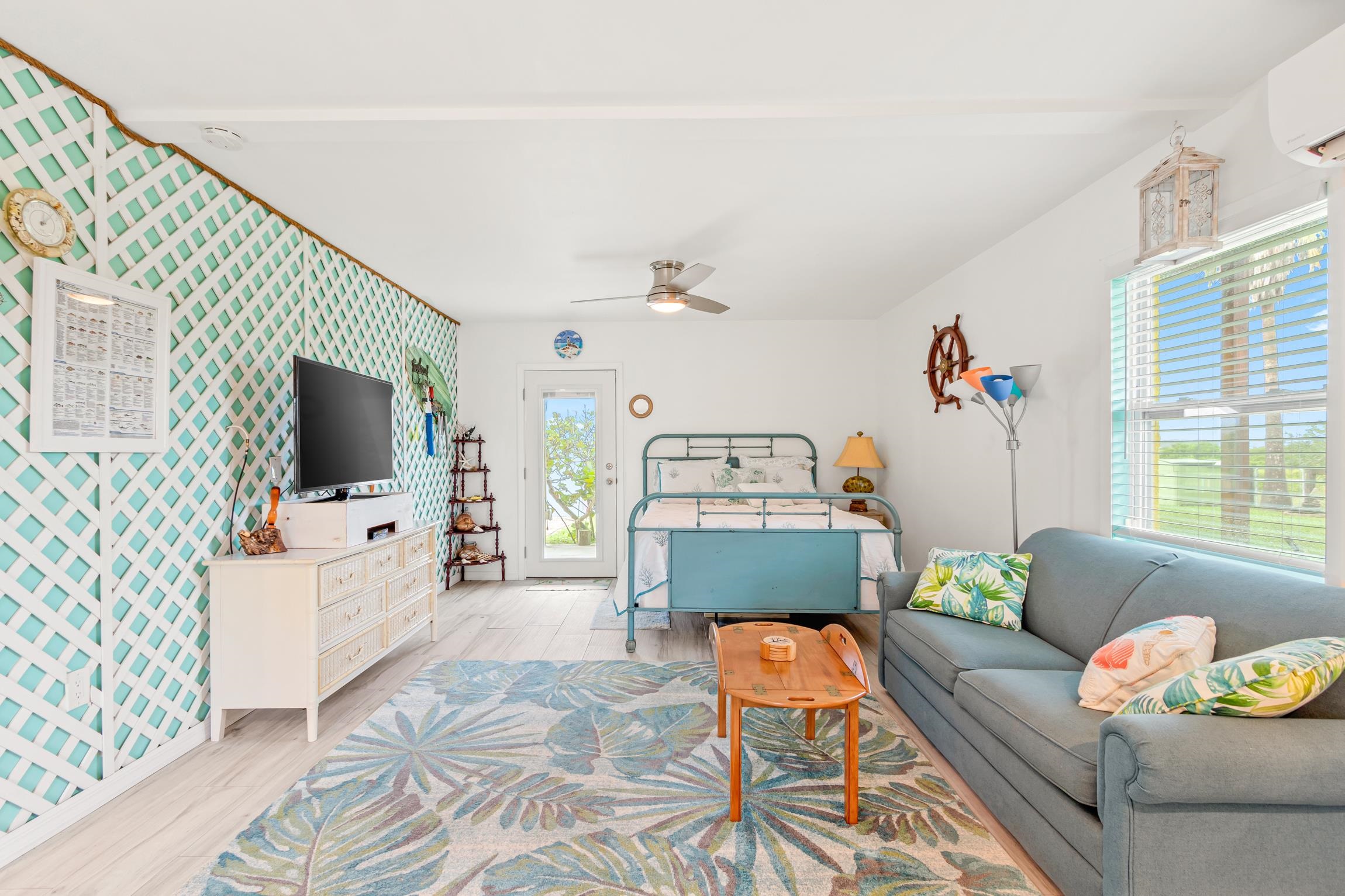 298 Majorca Road St. Augustine, FL 32080 - Photo 16 of 40 a living room with furniture and a flat screen tv