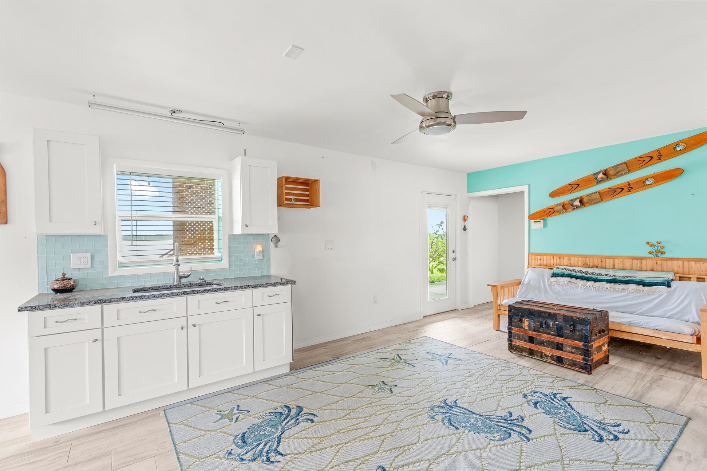 298 Majorca Road St. Augustine, FL 32080 - Photo 20 of 40 a spacious bathroom with a granite countertop sink and a mirror