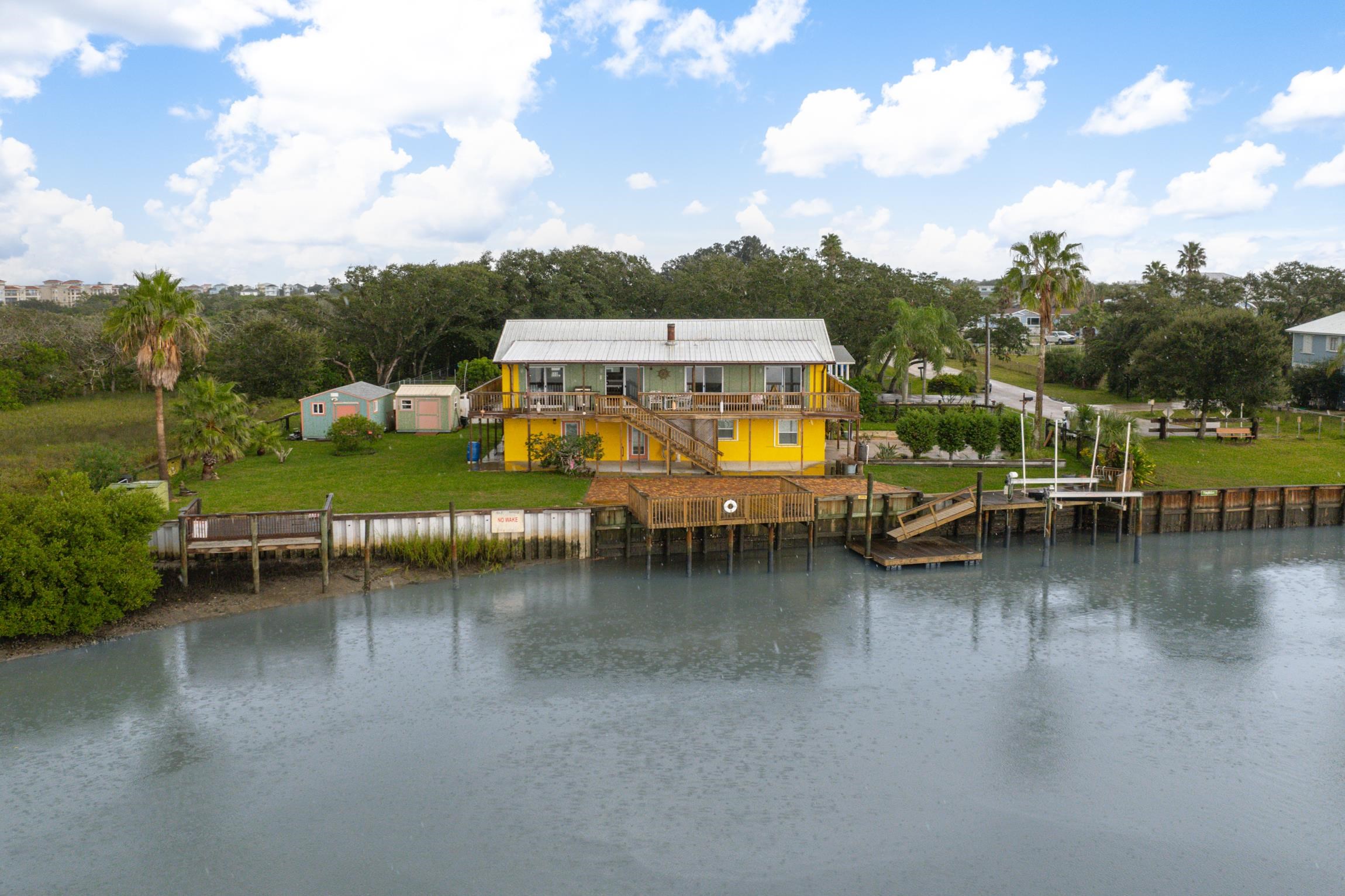 298 Majorca Road St. Augustine, FL 32080 - Photo 27 of 40 a view of swimming pool with outdoor seating and lake view