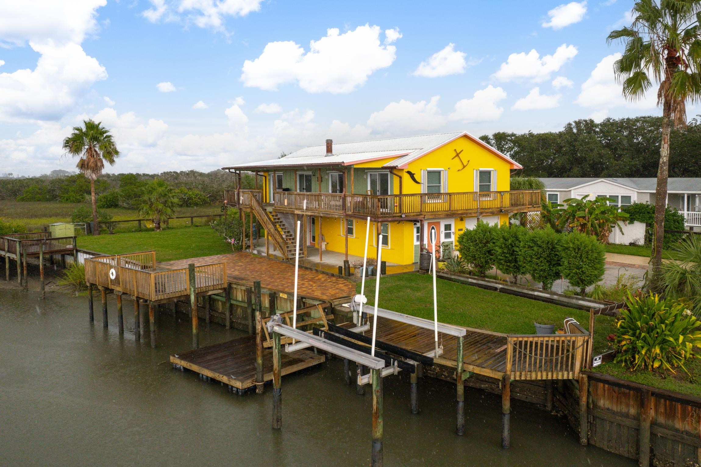 298 Majorca Road St. Augustine, FL 32080 - Photo 28 of 40 a view of a swimming pool with a lake view