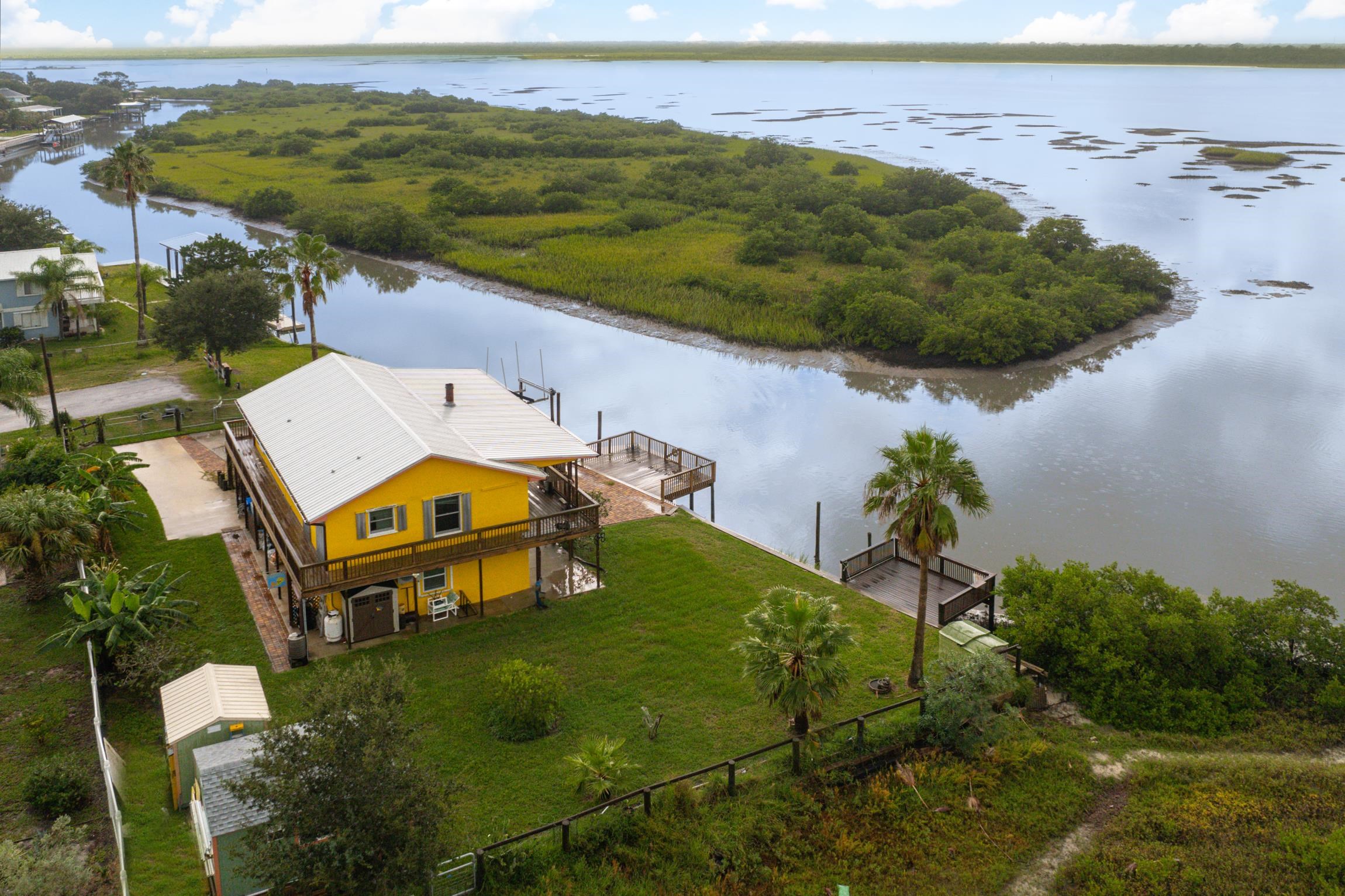 298 Majorca Road St. Augustine, FL 32080 - Photo 3 of 40 an aerial view of a house with a garden