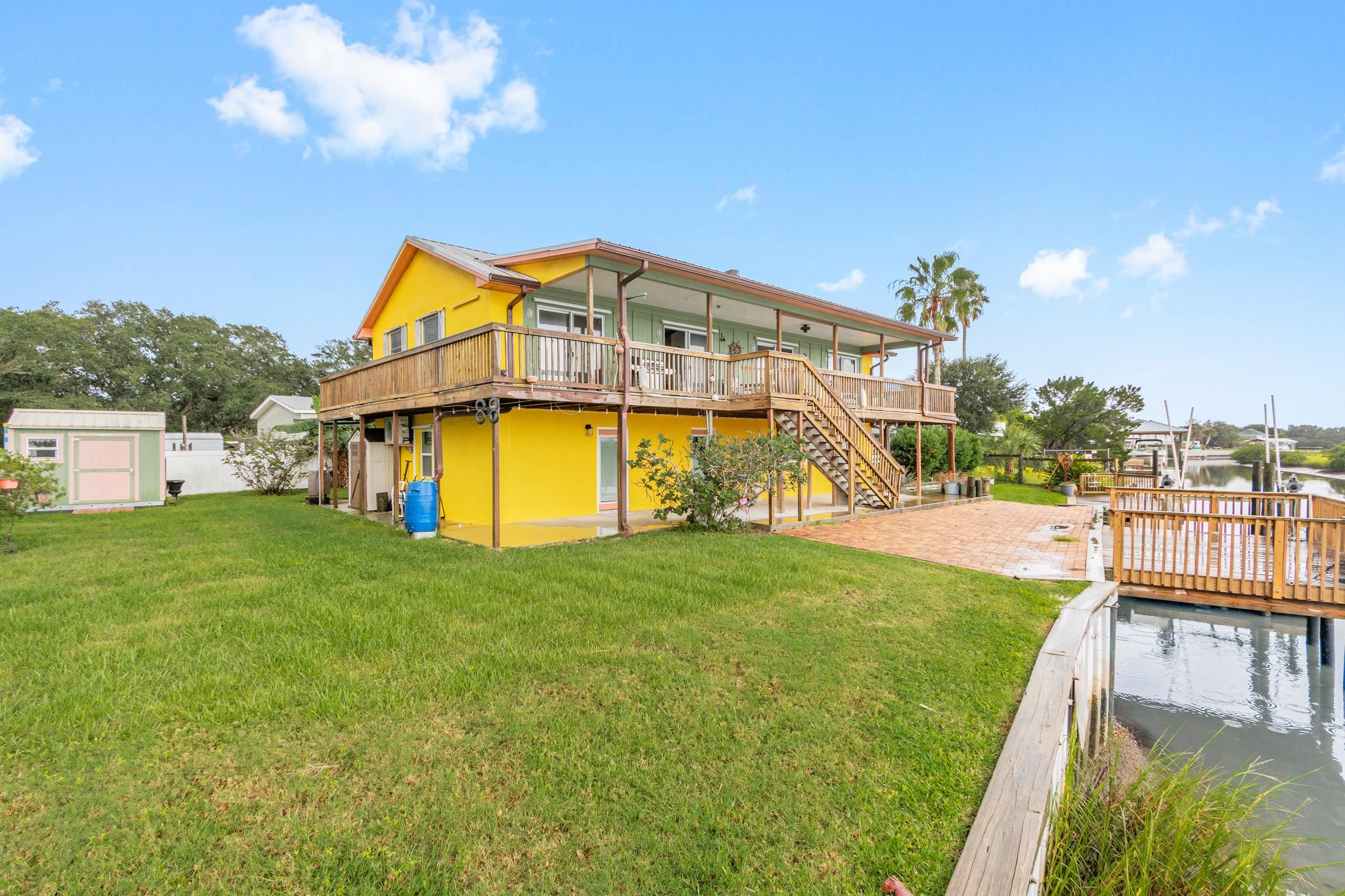 298 Majorca Road St. Augustine, FL 32080 - Photo 36 of 40 a view of a house with a swimming pool