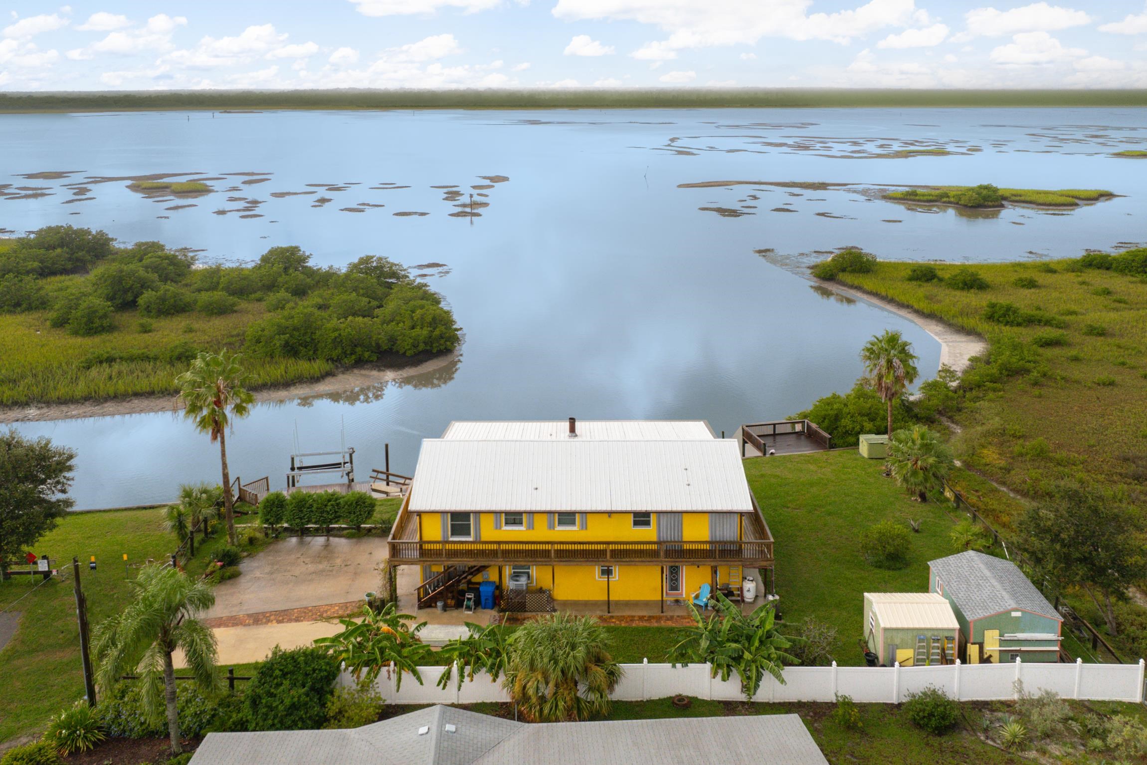 298 Majorca Road St. Augustine, FL 32080 - Photo 4 of 40 an aerial view of beach and ocean view