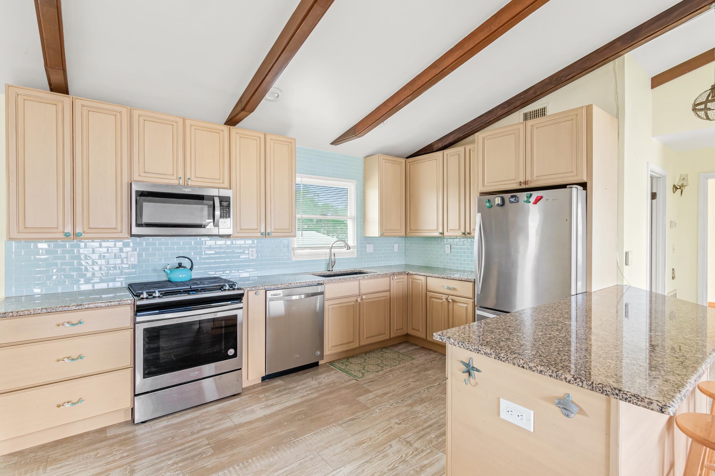 298 Majorca Road St. Augustine, FL 32080 - Photo 8 of 40 a kitchen with a refrigerator sink and microwave