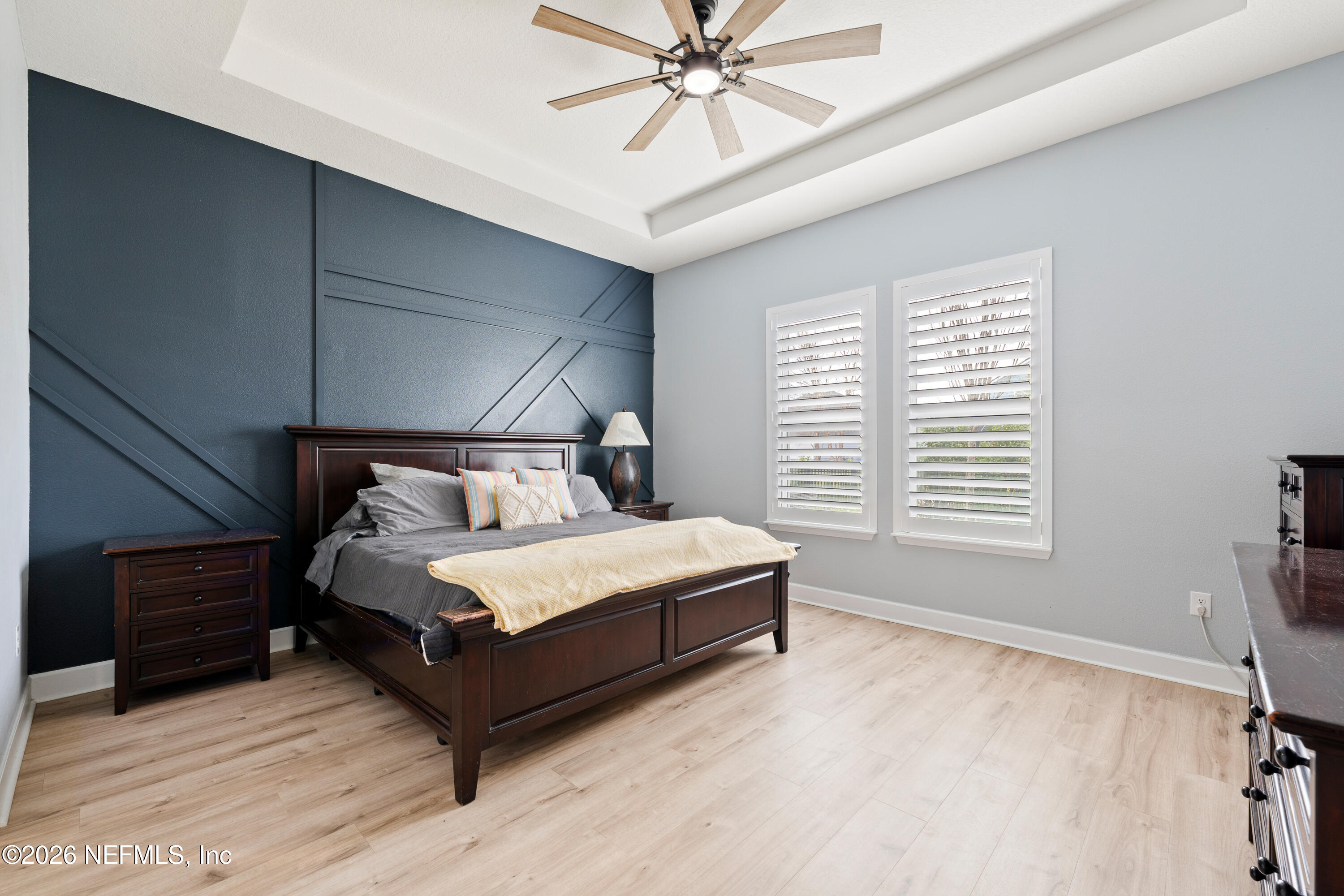 408 Rustic Mill Drive St. Augustine, FL 32092 - Photo 23 of 31 a bed sitting in a bedroom next to a window