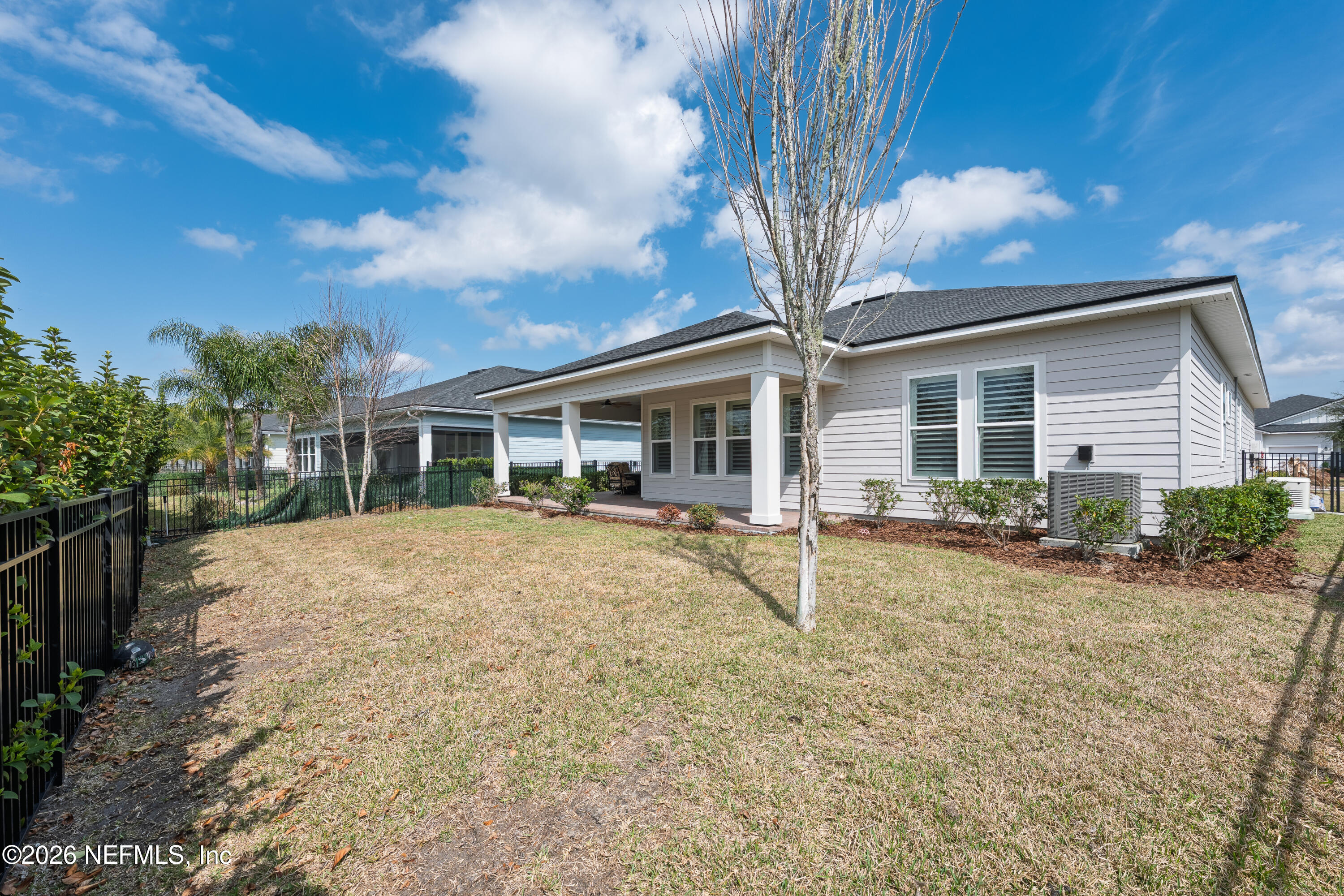 408 Rustic Mill Drive St. Augustine, FL 32092 - Photo 30 of 31 a house with trees in the background