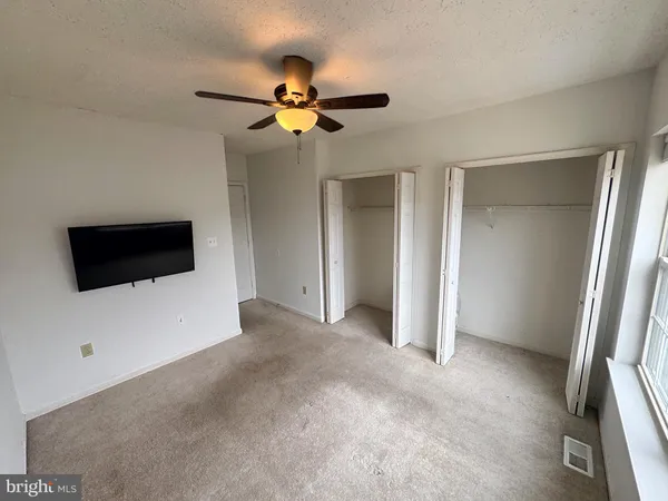 a view of a livingroom with a flat screen tv