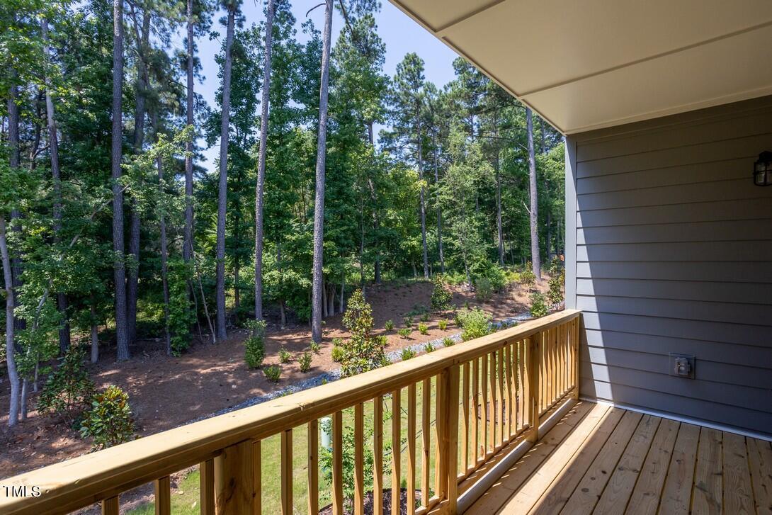 4703 Mint Leaf Lane Raleigh, NC 27612 - Photo 25 of 25 a view of a balcony with wooden floor