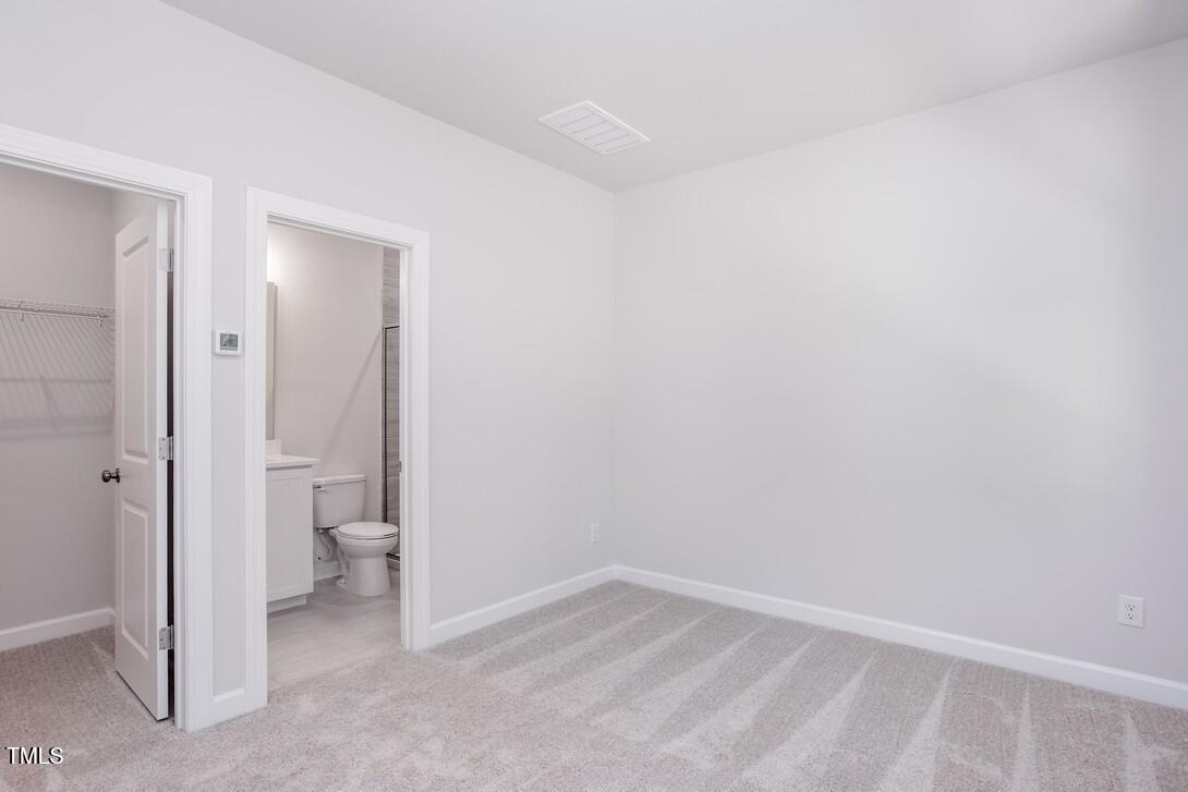 4703 Mint Leaf Lane Raleigh, NC 27612 - Photo 3 of 25 a view of an empty room