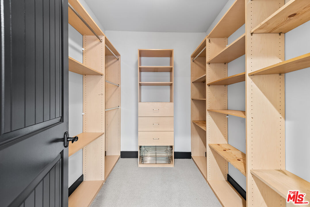 1215 Armacost Avenue, Unit 403 Los Angeles, CA 90025 - Photo 15 of 25 a view of an empty walk in closet