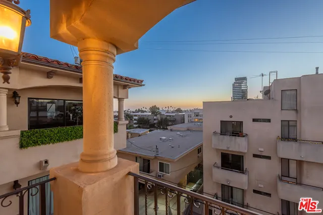 a view of a house with a sink and a yard
