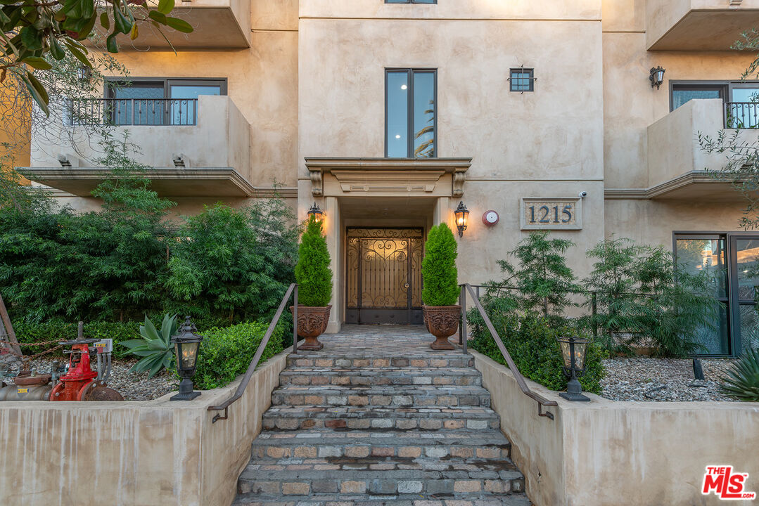 1215 Armacost Avenue, Unit 403 Los Angeles, CA 90025 - Photo 25 of 25 a front view of a house with entryway