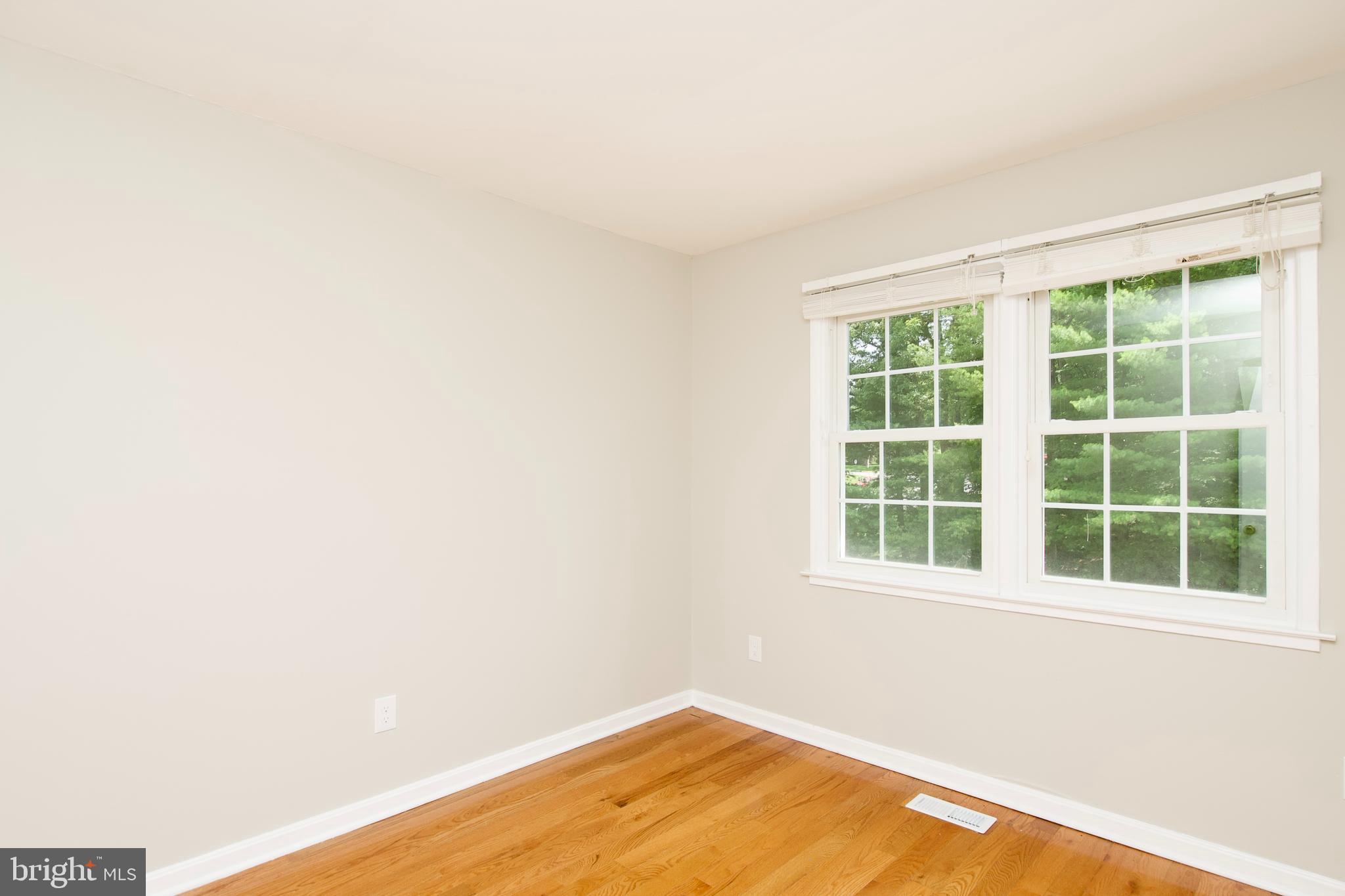 7726 Matisse Way Springfield, VA 22153 - Photo 17 of 34 an empty room with a window