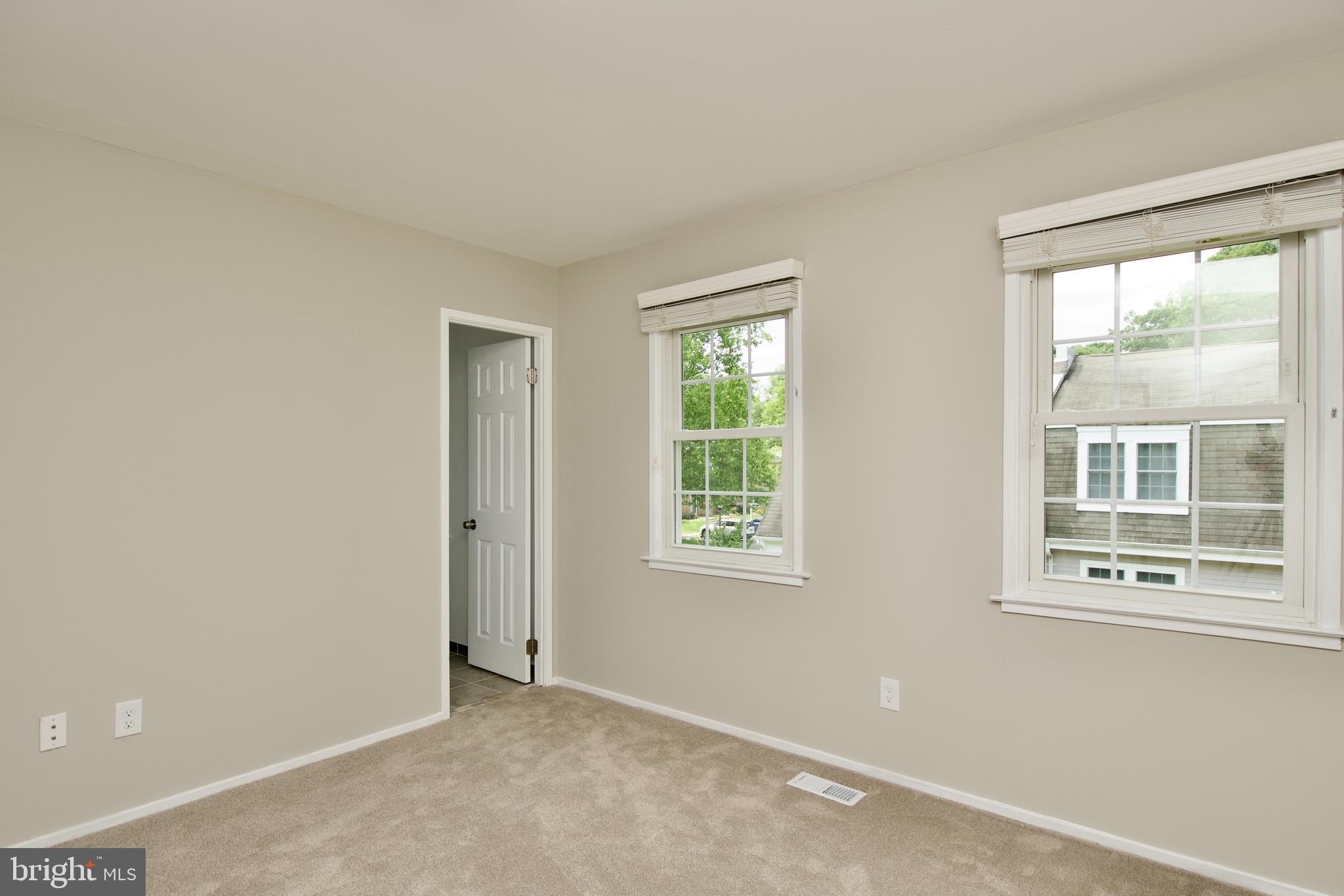 7726 Matisse Way Springfield, VA 22153 - Photo 25 of 34 an empty room with a window