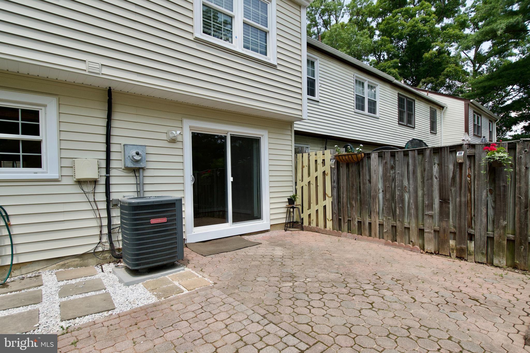 7726 Matisse Way Springfield, VA 22153 - Photo 30 of 34 a front view of a house with a garage