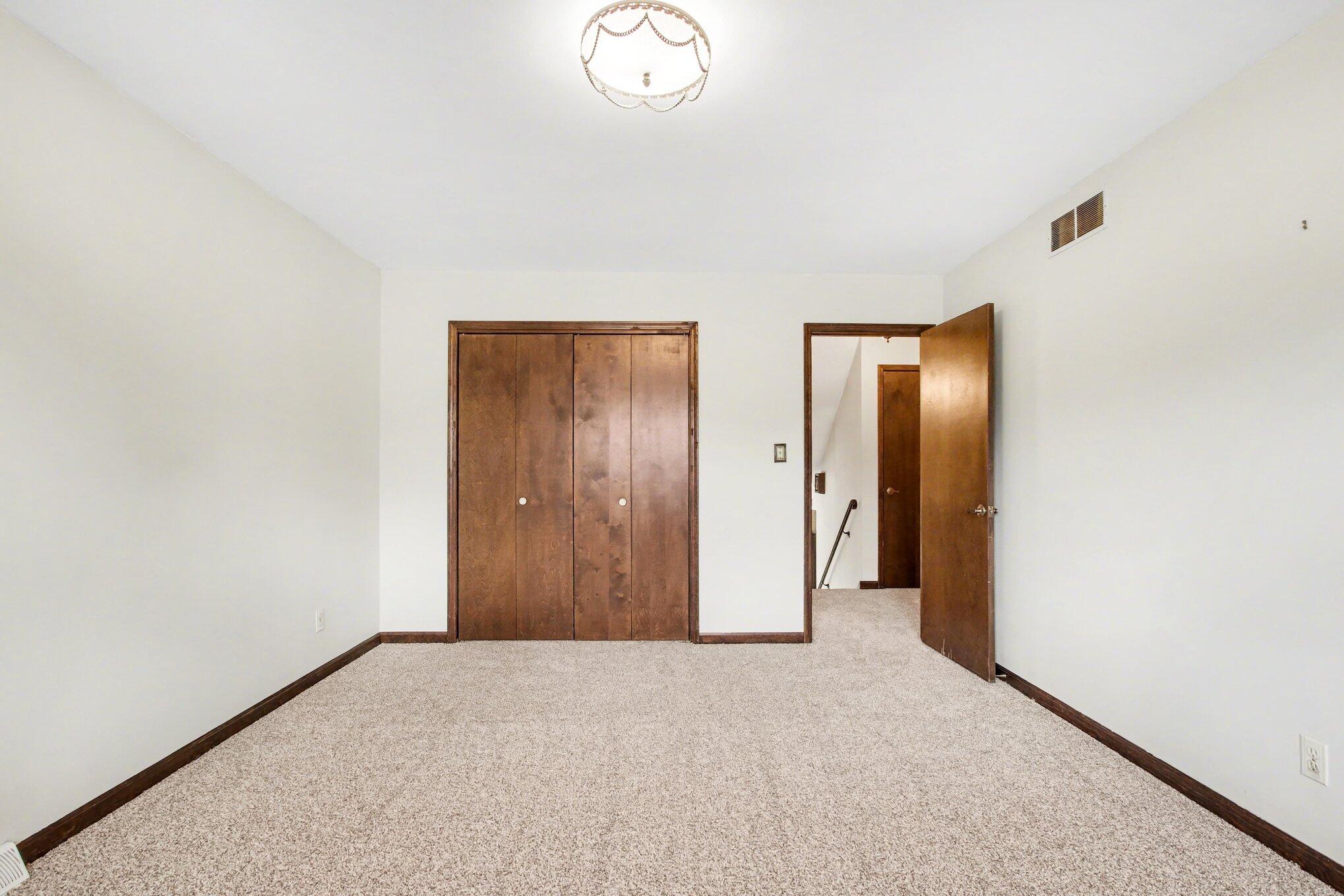 1379 Leeward Road Crown Point, IN 46307 - Photo 20 of 39 a view of an empty room and a bathroom