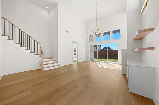 a view of an empty room with a fireplace