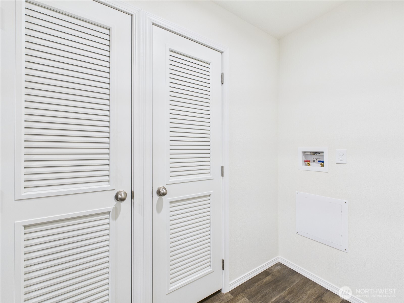 401 2nd Street Southwest Rock Island, WA 98850 - Photo 11 of 12 a view of a room that has a window and wooden floor