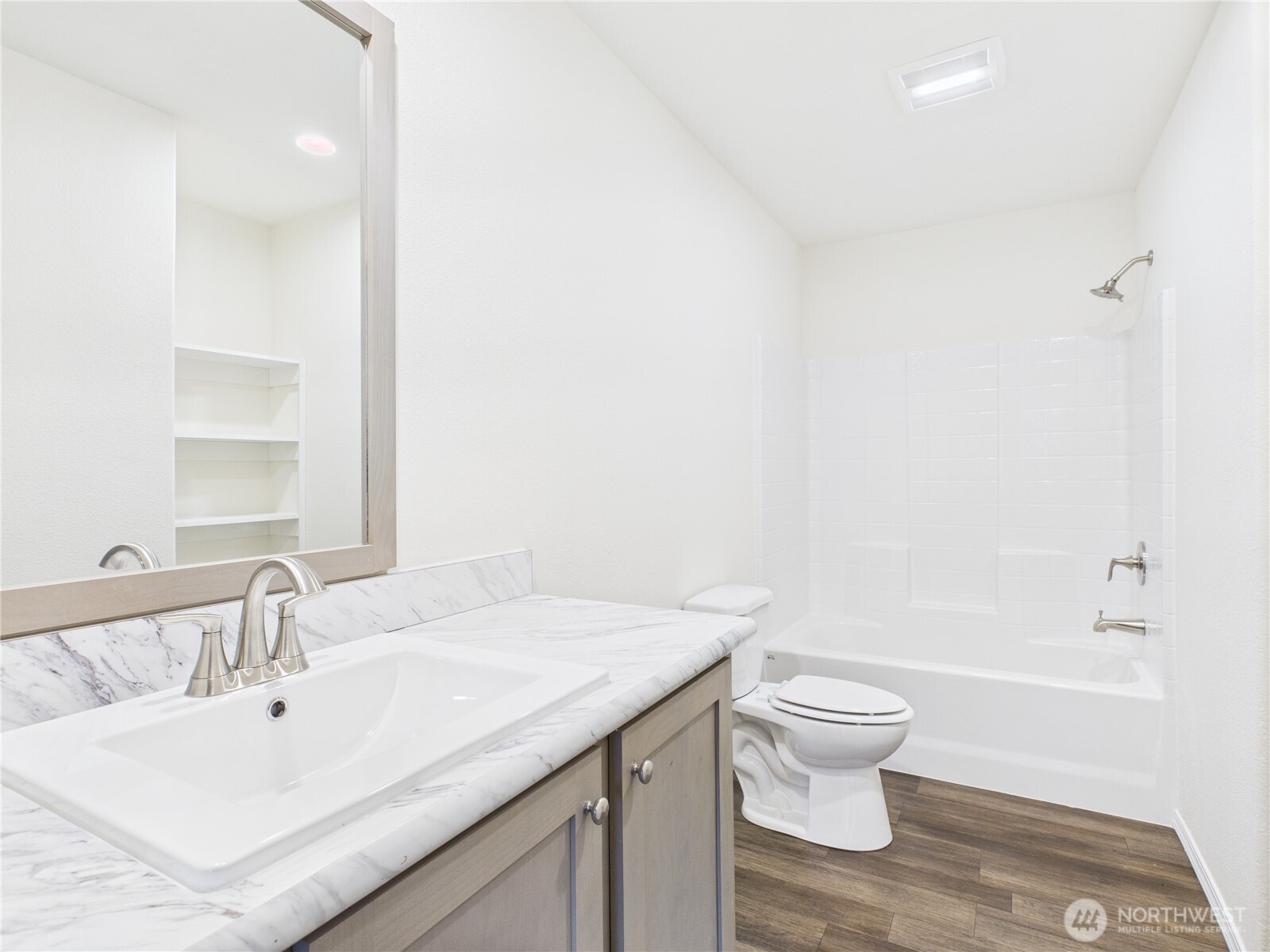 401 2nd Street Southwest Rock Island, WA 98850 - Photo 9 of 12 a bathroom with a sink toilet and shower