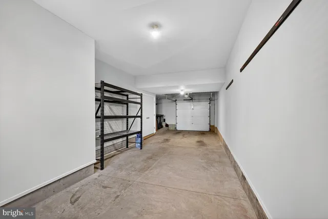 a view of a room with a staircase and a window