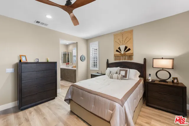 a view of a storage & utility room with two washing machine