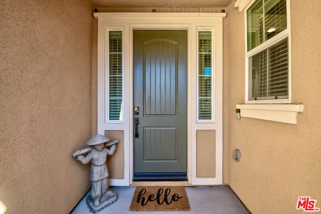 a bathroom with a sink double vanity and a shower