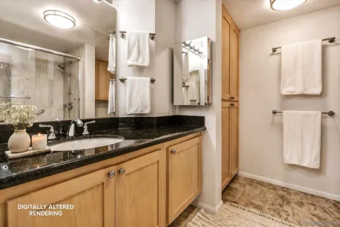 a bathroom with a sink and a mirror