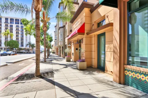 a street corner with retail shops