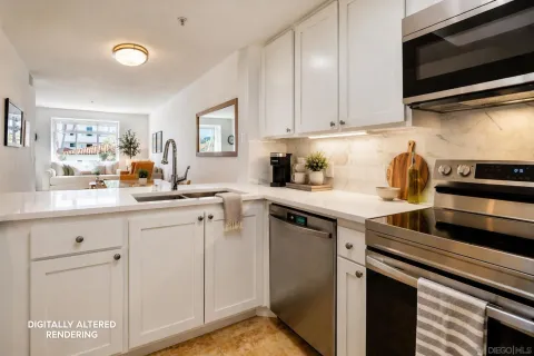 a kitchen with cabinets appliances and a sink