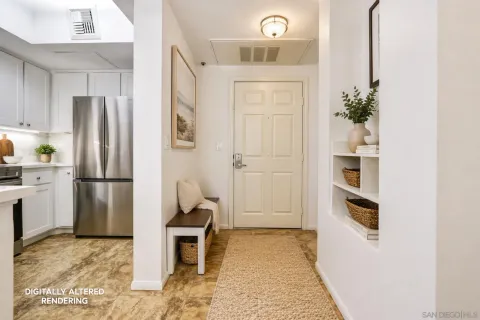 a kitchen with stainless steel appliances granite countertop a refrigerator and a stove